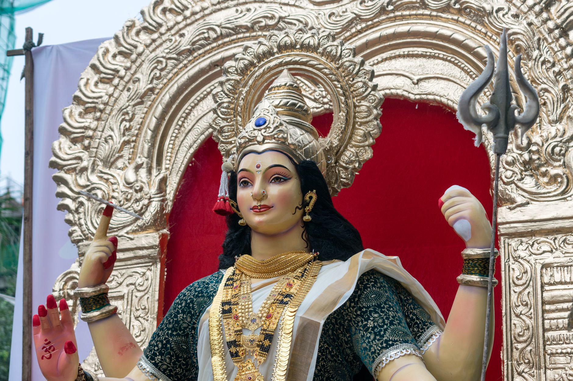 Close-up of a beautifully decorated Hindu goddess idol during Navratri festival in Mumbai.