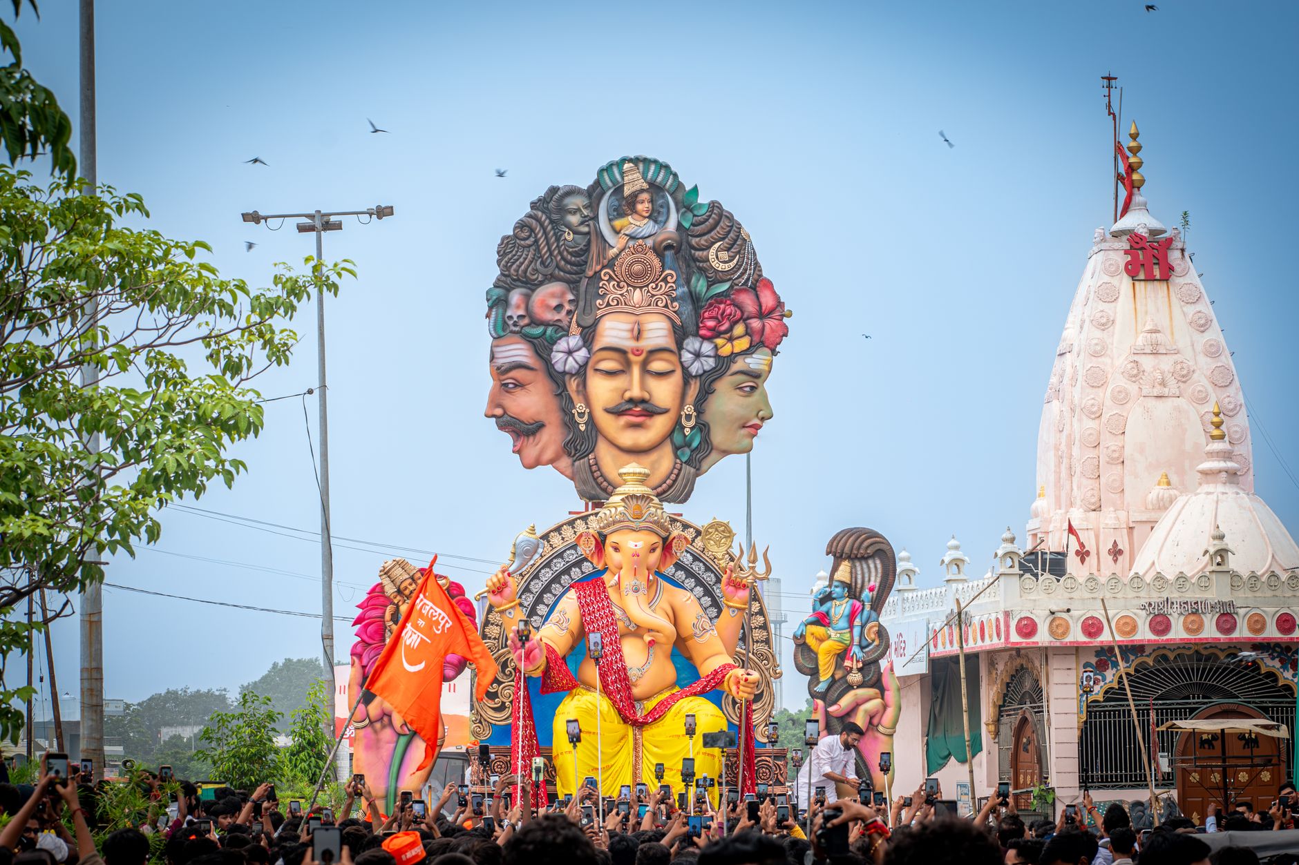Crowd gathers for a vibrant Ganesh Chaturthi celebration in Vadodara, Gujarat, India.